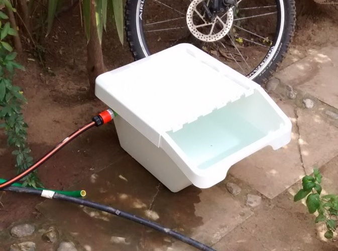 Auto water feeder for dogs from a recycling bin